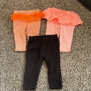 Bundle of Baby Girls Bottoms in Orange, Pink, and Black